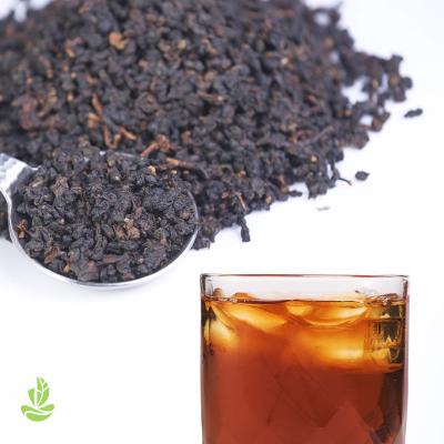 China Loose Tea 600g/bag Ball-Rolled Ripe Strong Fruity High Quality Natural Ruby Oolong Tea for sale