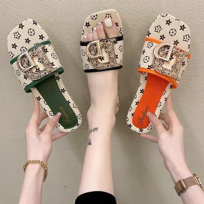 China Damping 2022 High Quality ICON Woven Slides Fashion Style Female Slippers Beach Slippers for sale