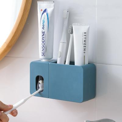 China Sustainable Toothpaste Vending Machine With Toothbrush Holder For Kids And Adults Hand Free Mounted Squeezer Wall Mounted Bathroom for sale