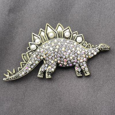 China ALLOY Qinsource Design Dinosaur Shape Large Pin Brooches Fashion Music Brooch Pins Snowman Brooch Jewelry For Women Crystal Rhinestone for sale