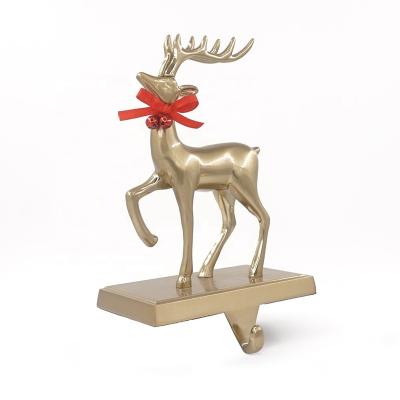 China Popular Christmas Gift Metal Natale Christmas Ornament 3D Gold Deer Decor Stocking Holder Holiday Christmas Decorations for sale