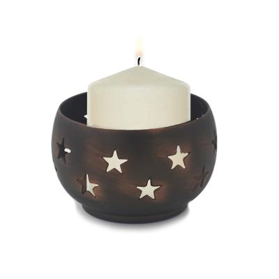 China Votive Antique Brass Metal Mini Hollow Candle Holder Home Decoration Star Pattern Tealight Cup Candle Holder for sale