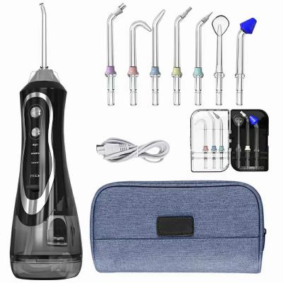 China Outdoor USB Rechargeable Flosser Portable Dental Water Flosser Jet 300ml 3 Mode Irrigator Teeth Cleaner for sale