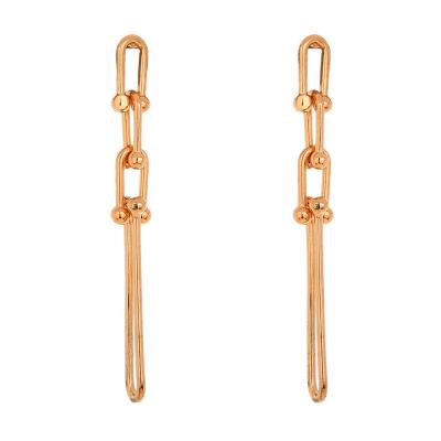 China 2021 romantic lady personalized fashion earrings metal chain button women's earrings long long hot bamboo simple U-shaped earrings for sale