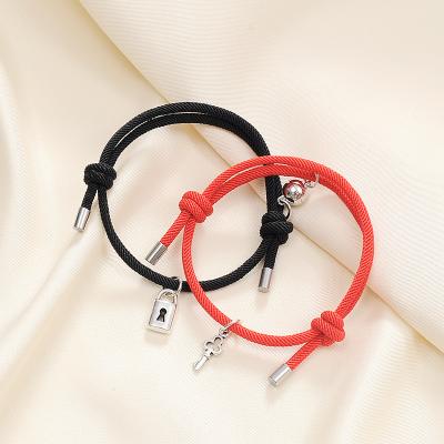 China Punk Trendy Adjustable Woven Key Bracelet Rope Attraction Magnet Alloy Alloy Key Mutual Lock Charms Tassel Bracelets For Couples for sale