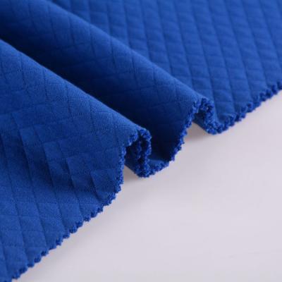 China 70% cotton 30% polyester diamond jacquard high quality anti-static air layer knit fabric for clothes for sale