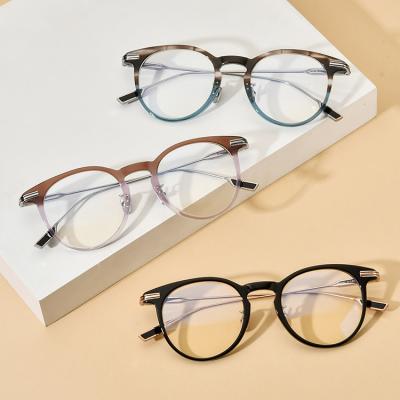 China Latest Leopard Two Color Reading Book Round Light Weight Anti Radiation Titanium Blue Myopia Handmade Acetate Eyeglasses Frames for sale