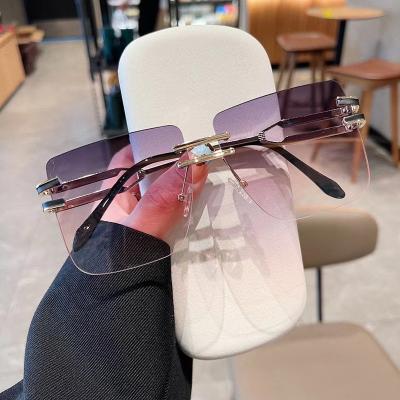 China Fashion Sunglasses 2022 Square Pink Oversized Sun Glasses Latest Anti Gradient Ocean Film Big Metal UV Rimless Luxury Frameless Female Sunglasses for sale