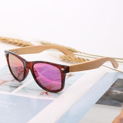 China Fashion 2022 PCS Custom Made Bamboo Wood Sunglasses TAC Lens Sunglasses With Vintage Handmade Oval Tortoiseshell Temple Butterfly Logo for sale