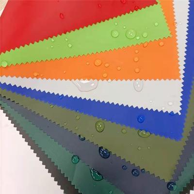 China Flame Retardant PVC Coated 190 T Taffeta Waterproof Raincoat Material for sale