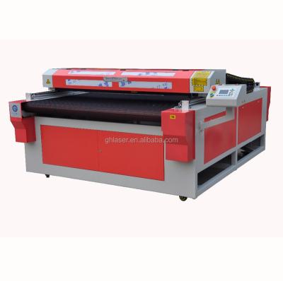 China Laser REDUCING 1618 1610 1625 Automatic Fabric Textile Fabric Laser Cutting Machine Feeding Price for sale