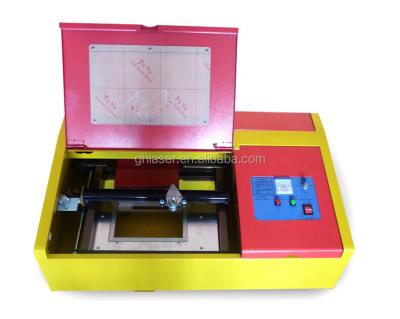 China Laser Engraving MiniGH-40T Mini Hobby Cheap Lathe Engraving And Cutting Machine for sale