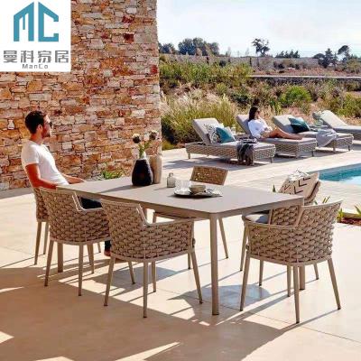 China Modern Nordic Outdoor Aluminum Frame Woven Rope Patio Furniture Set 6 Chair Garden Patio Dining Table Chairs And Table Set for sale