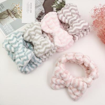 China Fashional Lady Fashion Cute Soft Plush Wave Point Bowknot Towel Headband Elastic Cute Headband For Ladies for sale