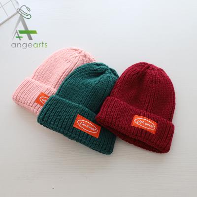 China COMMON Warm Skullies Woven Label Beanie Knitted Hats Custmo Logo Winter Caps High Quality Acrylic Gray for sale