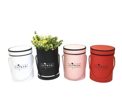 China Handmade Simple Small Hug Bucket Gift Flower Box Round Mini Bouquet Gift Box for sale