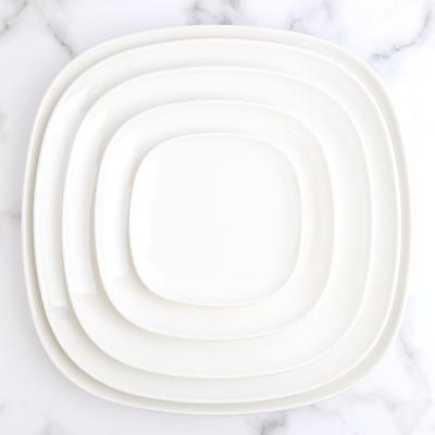 China 24cm Viable 9.5 Inch Simple White Graceful Custom Porcelain Dinner Dishes Logo Decal Printable Cheap Bulk Dishes for sale