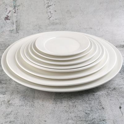 China Sustainable Wholesale 7 Inch Porcelain Cake Bread Cookie Dish Flat White Ceramic Dish With Rim for sale