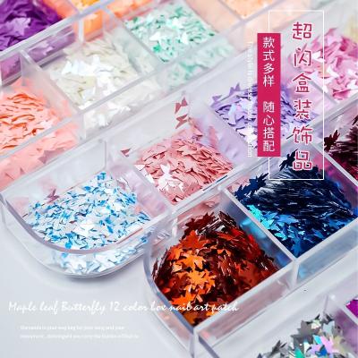 China Mixed Color Laser Sequins DIY Nail Patch Long Box McMann Nail Beauty Products Butterfly Maple Leaf Sequins 12 Strip Nail Patch Foil Ornament for sale