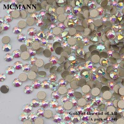 China 3d Nail Art DIY Decoration Hot Sale Wholesale 1440 Pcs Bag White Nail Art Crystal Shining Flat Back Rhinestones Clear Gold and Ab Color Background for sale