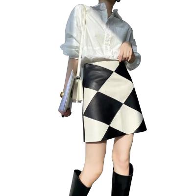 China One-shape skirt color body pin rhombus sheep short skirt breathable leather skirt half hundred laps slightly for sale