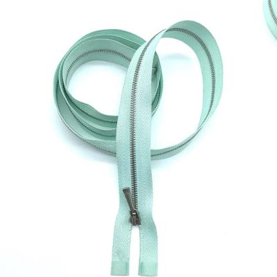 China Other Platinum 0#1#2# Open End Single Metal Zipper For High Grade Stylish Garments for sale