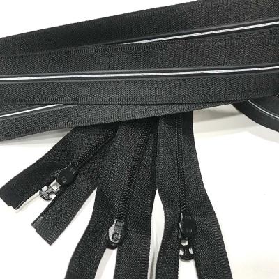 China Various Length Reversible Open End Nylon Reversible Invisible Self Locking Zipper For Dress for sale