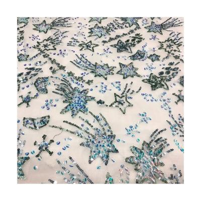 China Viable Popular Sequin Embroidered 3 + 6mm Laminated Star Apparel Fashion Mesh Sequin Embroidered Fabric for sale