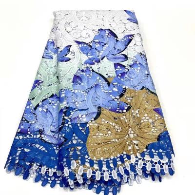 China Milk silk viable water soluble hollow out embroidery lace embroidery trim printed fabric European American women's sequin fabric for sale