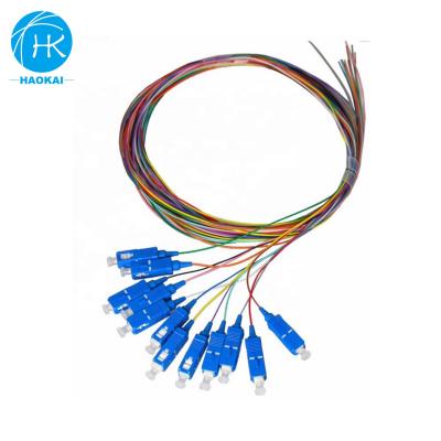 China FTTH FTTB FTTX Network G652 12 Core Optical Ribbon 62.5/125 Mm Duplex SC 900Mm Loose Tube Fiber Optic Pigtail for sale