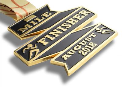 China Logo Custom Ribbon Shape Custom Award Medals Soft Enamel Die Casting Plated for sale