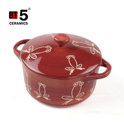 China Sustainable Round Shape Two Handle Red Ceramic Casserole Dish Smooth Lines With Lid for sale