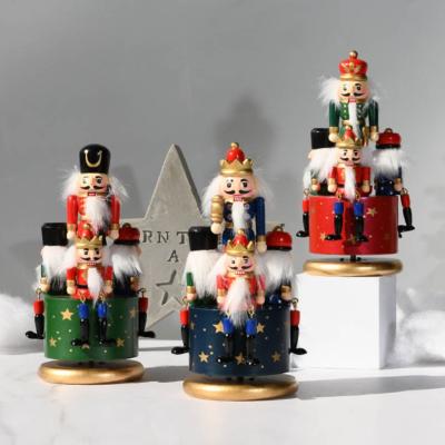 China Home Decoration Open Music Box Wooden Nutcracker Home Christmas Ornament Hand Painting Rotating Music Box for sale