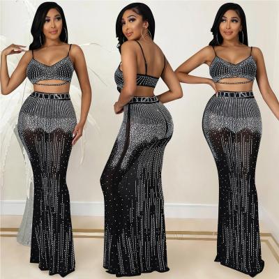 China New sexy women's long skirt set two-piece mesh breathable camisole perspective mesh party nightclub rhinestone for sale