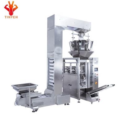 China Automatic High Efficiency High Accuracy Chemical Fertilizer Granules Filling Sealing Machine Into Small Bag for sale