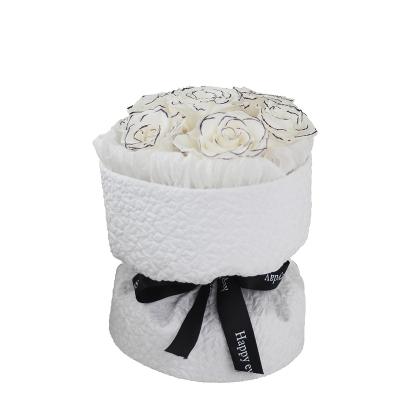 China Luxury Natural Fresh Rose Valentine's Day Gift with 7 Eternal Roses Wrapped in White Leather Embossed Immortal Pattern Flowers for sale