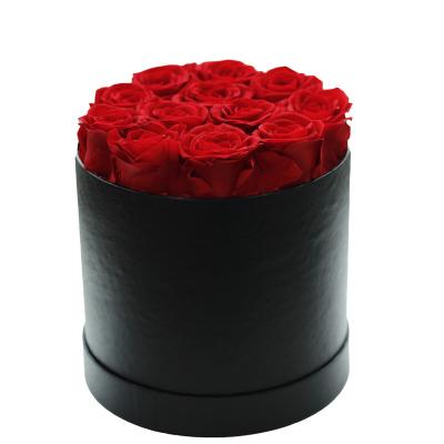 China Gift decoration flowers date Christmas new year gift black round box with 12 roses forever preserved eternal immortal for sale