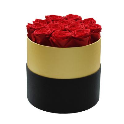 China Christmas Gift Decoration Flowers New Year Gift Gold Trim Round Box with 12 Roses Forever Preserved Eternal Immortal for sale