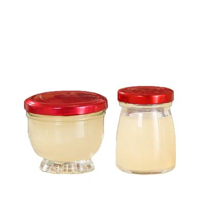 China Other 50ml 75ml 100ml 150ml Honey Storage Bird Round Nest Glass Bottle Jar Wholesale With Hook Top for sale