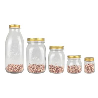 China Wholesale Different Sizes Food Canning Container Mason Jar Storage Airtight Clear Glass Jar With Stainless Screw Lids for sale