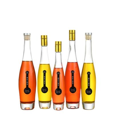 China Custom 330ml 500ml 700ml Beverage Sized Liquor Glass Ice Wine Bottle Vodka Bottle Fruit Wine Bottle With Cork Top for sale