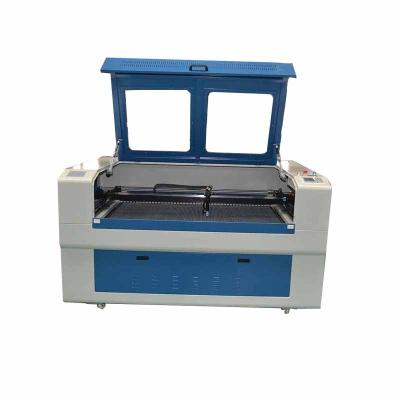 China Laser Engraving Co2 Laser Engraving And Cutting Machine For Wood, Plastic, Garments for sale