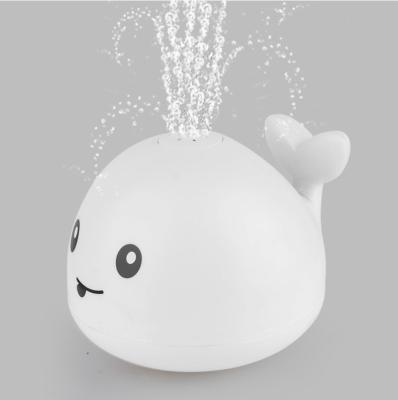 China infant toy wetting to the sounds of Toy Cartoon Whale Electric Induction Sprinkler Bathtub Music Light Water Squeeze Water Spray Toy Baby Bath Toy Shower for sale