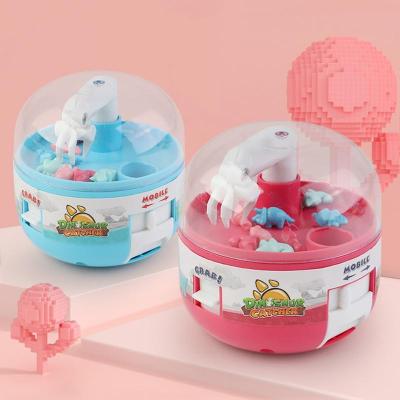 China Toy Dinosaur Grabbing Machine Capsule Mini Claw Machine 4/8 Stuff Toy Children's Grabber Catcher Toy Birthday Gift Tiny Capsule Fresh for sale