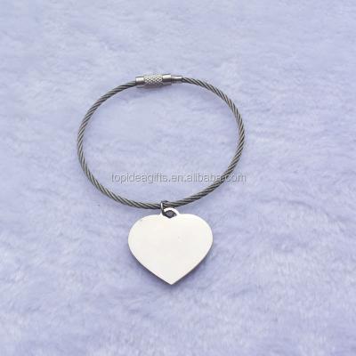 China Blank Blanks Promotion Gifts Sublimation Metal Heart Keychains And So On Engrave Logo Metal Purse Charms for sale