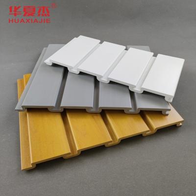 China ISO White Wooden PVC Slatwall Panels / Wood Plastic Slotted Wall Board for sale