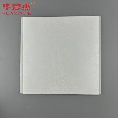 Chine Panneaux en PVC muraux de haute qualité de 250x5 mm, avec motifs floraux stratifiés, panneau de plafond en PVC pour la décoration murale de la maison à vendre