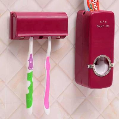 China Viable Wholesale Automatic Toothpaste Squeezing Device Lazy Person Squeezes Punchless Toothpaste Holder Toothpaste Squeezes for sale