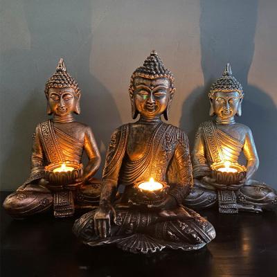 China Middle East High Quality Stores Home Decorative Buddha Candlestick Ornaments Statue Resin Crafts for sale