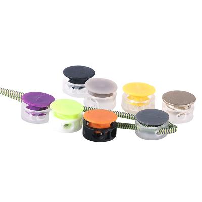 China Factory Sale 2 Holes Twine Strap End Plastic Spring Nickel Free Running Colored Rope Stopper For Garment And Bags for sale